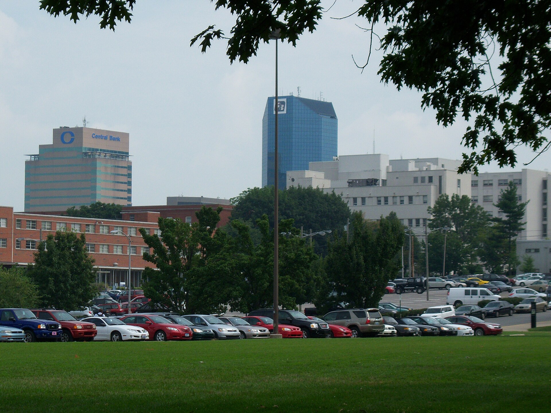Lexington, Kentucky under an evening sky, looking across the city toward the Bluegrass hills